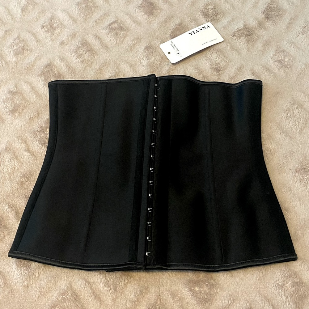 Waist trainer size medium with three hook options. NWT.